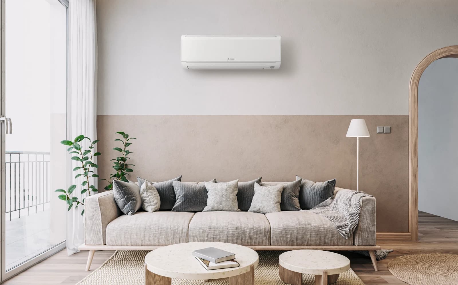 Mitsubishi Electric MSZ-GS wall-mounted heat pump above a sofa in a living room